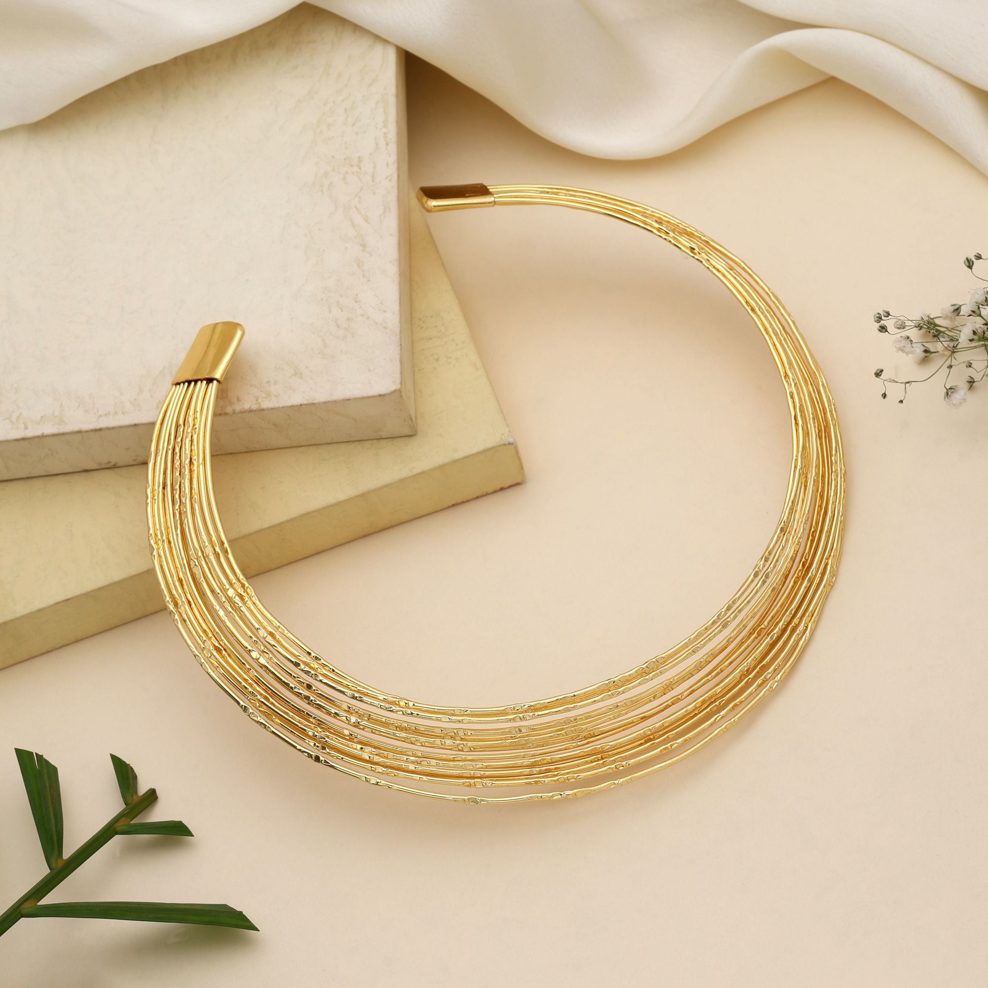 Stylish Gold Color Amrapali Hansli Necklace Designed To Enhance Classic Ethnic Necklace Styling Beautifully - Gold