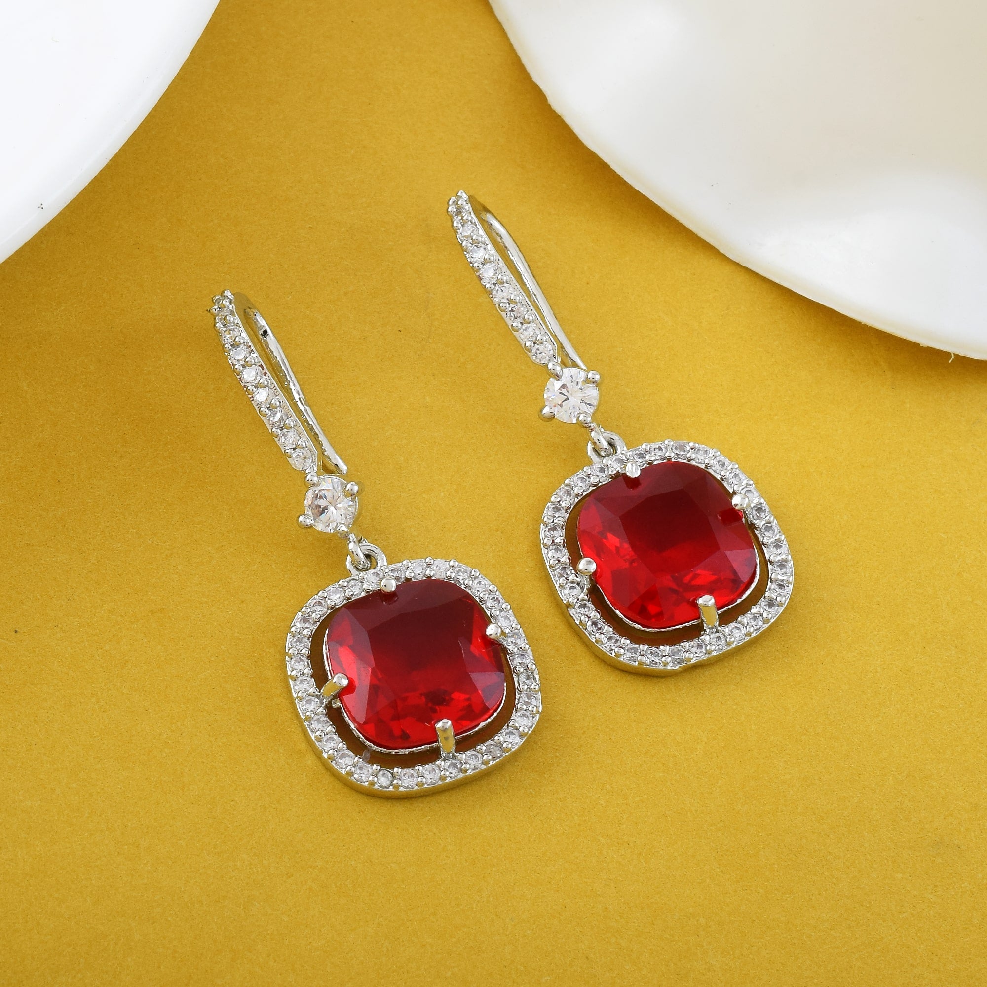 Red Color American Diamond Earrings In Twisted Loop Inspired Statement Design - Red