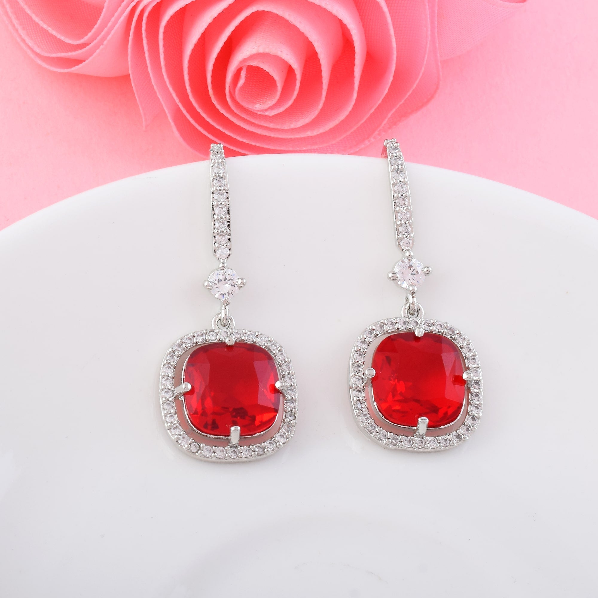 Red Color American Diamond Earrings In Twisted Loop Inspired Statement Design - Red